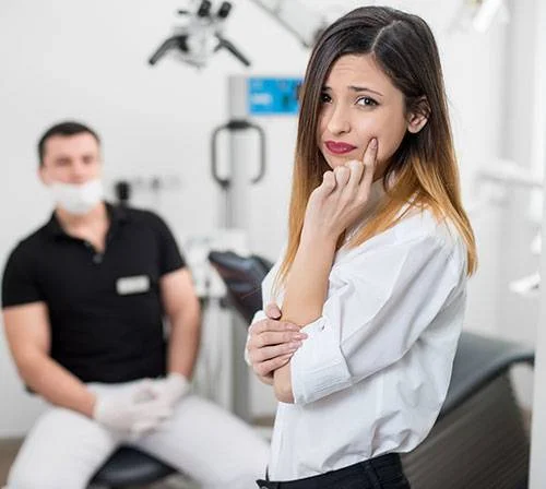 dentist looks patient ghauri dental centres dental emergency services dentist looks patient ghauri dental centres dental emergency services